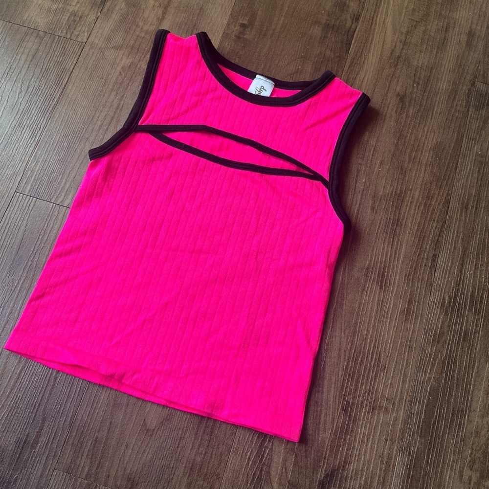 Neon pink crop tank top with contrast black stitching. Also has keyhole design